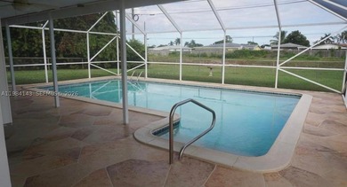 This well-kept 4-bedroom, 2-bath ranch sits on a spacious .27 - photo 1