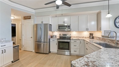 Experience the ultimate lake lifestyle in this impeccably