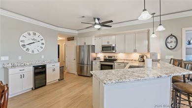 Experience the ultimate lake lifestyle in this impeccably