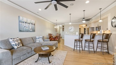 Experience the ultimate lake lifestyle in this impeccably