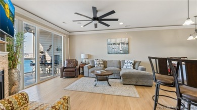 Experience the ultimate lake lifestyle in this impeccably