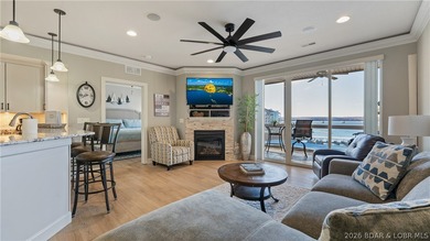 Experience the ultimate lake lifestyle in this impeccably