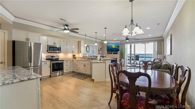 Experience the ultimate lake lifestyle in this impeccably