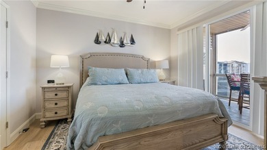 Experience the ultimate lake lifestyle in this impeccably