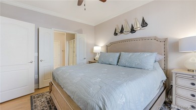 Experience the ultimate lake lifestyle in this impeccably