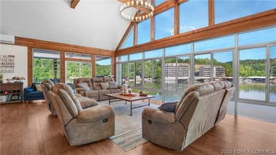 Experience luxury lakefront living on a scale rarely found at - photo 3