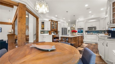 Experience luxury lakefront living on a scale rarely found at - photo 5