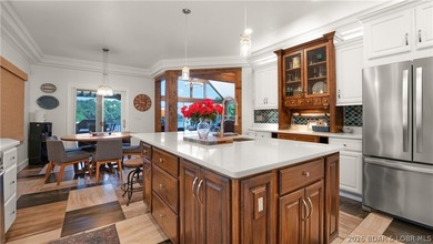 Experience luxury lakefront living on a scale rarely found at - photo 6