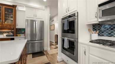 Experience luxury lakefront living on a scale rarely found at - photo 7