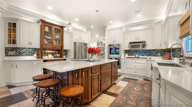 Experience luxury lakefront living on a scale rarely found at - photo 8