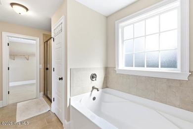 This beautiful move-in ready 4-bedroom, 3.5-bath home offers a - photo 12