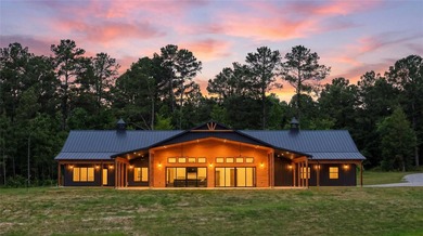 Set on 150.55 acres just outside Rusk, Texas, this luxury - photo 1