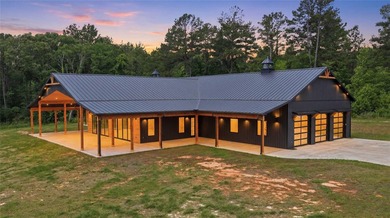 Set on 150.55 acres just outside Rusk, Texas, this luxury - photo 2