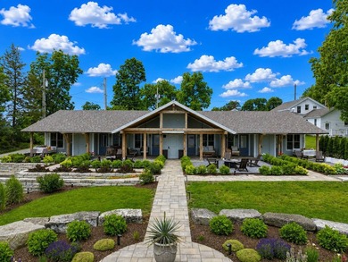 Welcome to this rare, income-producing waterfront retreat in - photo 8