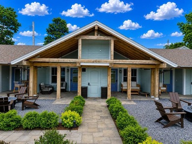 Welcome to this rare, income-producing waterfront retreat in - photo 9