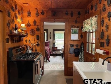 NESTLED AMONG TREES IS YOUR PRIVATE PARADISE FOR THIS NOSTALGIC - photo 13
