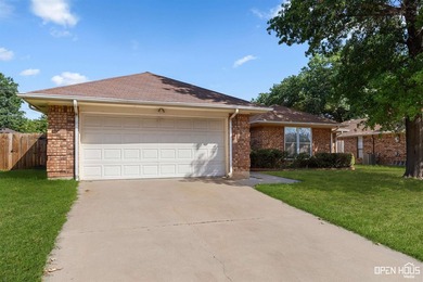Welcome to this charming 3-bedroom, 2-bath home in the highly - photo 2