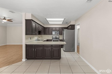 Welcome to this charming 3-bedroom, 2-bath home in the highly - photo 10