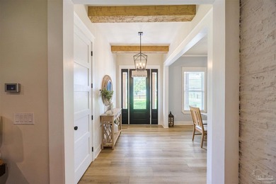 Home on a stunning 1.77-acre lot, this professionally designed - photo 3