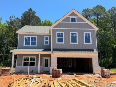 Lake Home For Sale in Flowery Branch, Georgia