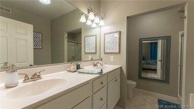 Wake up to stunning main channel views from this beautifully