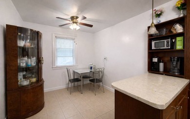 Rare opportunity to own a detached 1925-built residence on a - photo 9