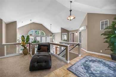 This 5-bedroom, 3.5-bath lakefront home in Four Seasons is - photo 6