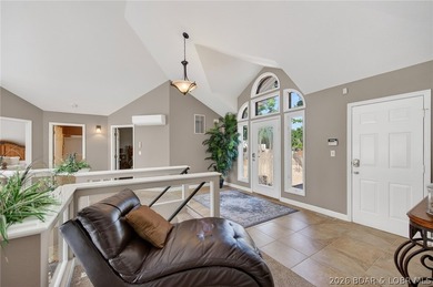 This 5-bedroom, 3.5-bath lakefront home in Four Seasons is - photo 8