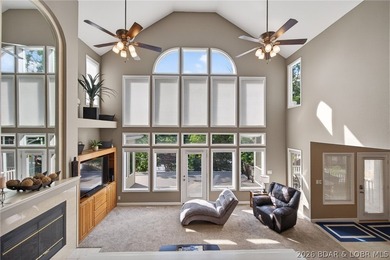 This 5-bedroom, 3.5-bath lakefront home in Four Seasons is - photo 9