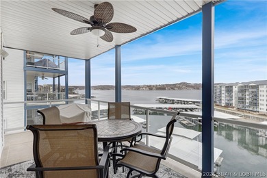 This well-positioned 5th-floor end-unit condo offers expansive