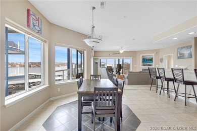 This well-positioned 5th-floor end-unit condo offers expansive