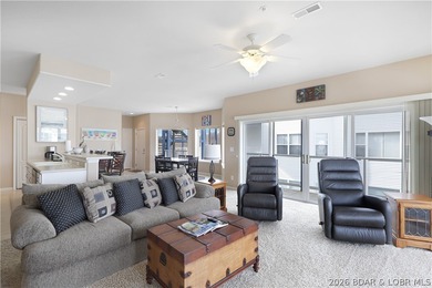 This well-positioned 5th-floor end-unit condo offers expansive