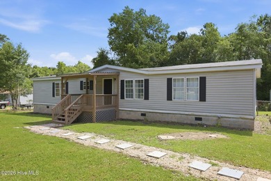Escape to privacy and convenience in this charming 3-bedroom - photo 3