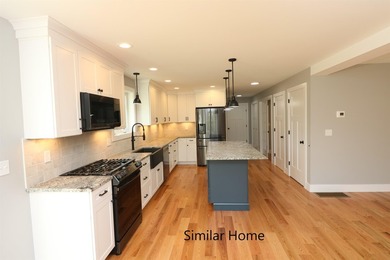 Welcome to The Fields at Mill Pond! This new construction home - photo 3