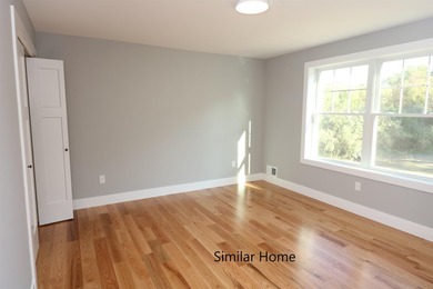 Welcome to The Fields at Mill Pond! This new construction home - photo 8