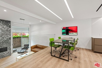 This extensively renovated front-facing multi-story townhome - photo 11
