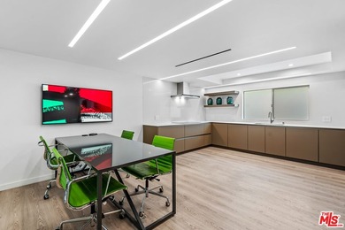 This extensively renovated front-facing multi-story townhome - photo 12