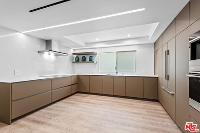 This extensively renovated front-facing multi-story townhome - photo 13