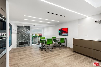 This extensively renovated front-facing multi-story townhome - photo 14