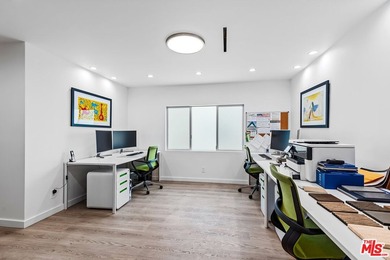 This extensively renovated front-facing multi-story townhome - photo 23