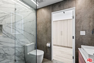 This extensively renovated front-facing multi-story townhome - photo 26