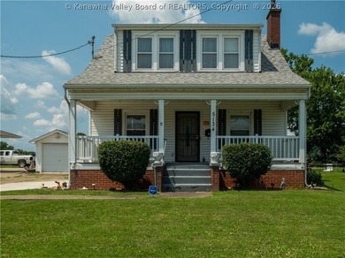 Historic riverfront home offering 1,967 sq ft on a .30-acre flat - photo 1