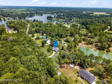Set on 1.32 cleared, unrestricted acres in the highly - photo 45