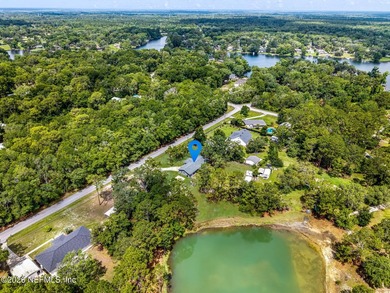 Set on 1.32 cleared, unrestricted acres in the highly - photo 46