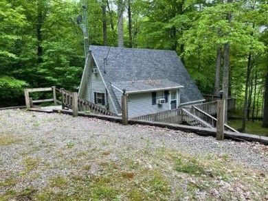 Lakefront with a Dock and just in time for Summer! This lake - Lake Home Sale Pending in Falls of Rough, Kentucky