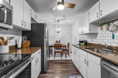 Affordable lake living at Medicine Lake! This top-floor 1-bed - photo 5