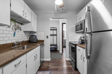 Affordable lake living at Medicine Lake! This top-floor 1-bed - photo 6