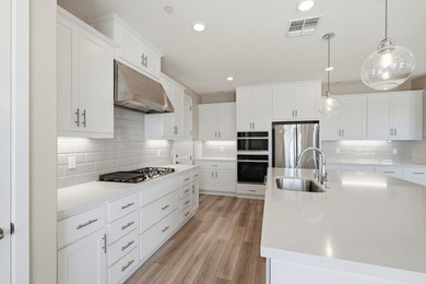 Waterfront Estate! Experience elevated living in the prestigious - photo 11