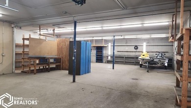 Former equipment dealership building on 1.27 acres at the west