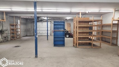 Former equipment dealership building on 1.27 acres at the west